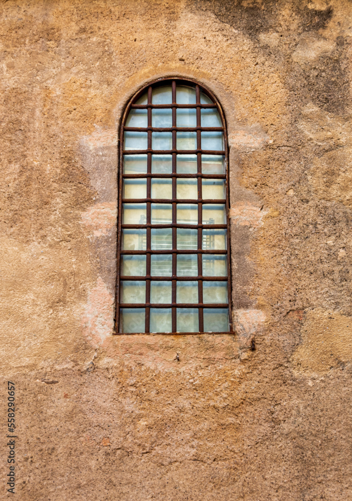 old window with rusted security