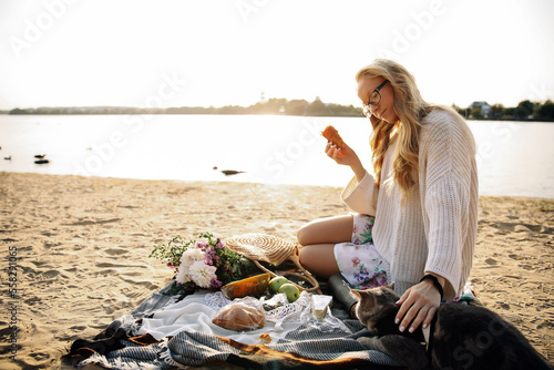 Woman blonde On The Beach In Spring photo