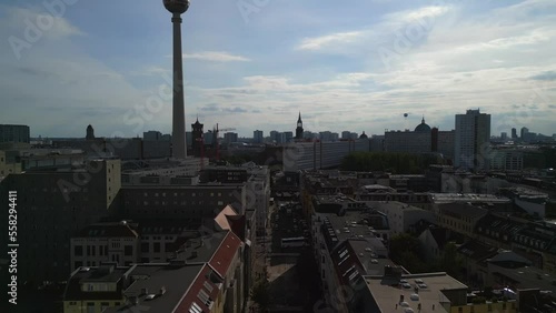 Berlin TV tower in twilight with sun. Buttery soft aerial view flight tilt up drone
berlin Rosa Luxemburg place day 2022. 4k marnitz Cinematic photo