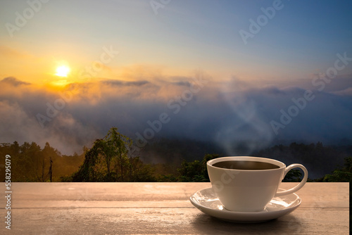 Coffee cup on wooden table in the morning, Coffee in the nature view.