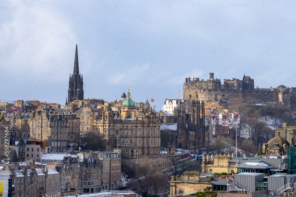 Calton Hill , Cityscape view of Edinburgh old town numerous monuments and buildings around during winter snow at Edinburgh , Scotland : 28 February 2018