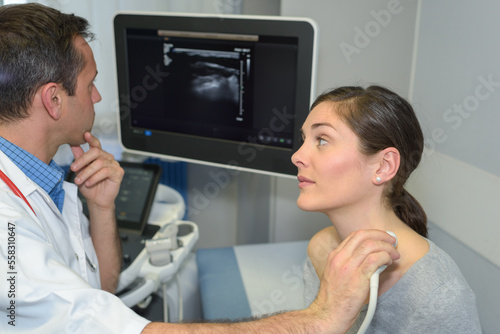 woman having neck ultrasound