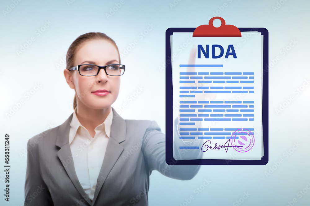 Businesswoman in non disclosure agreement concept Businesswoman in non disclosure agreement concept