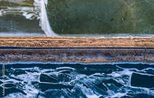 Wallpaper Mural Aerial view of the road on the embankment in winter Torontodigital.ca