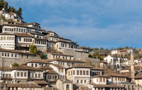 Traditional houses In Berat, Albania, Europe. Cityscape with those famous aligned white facades. Blue sky