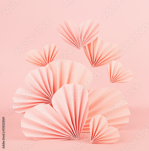 Valentines day background - stage with soar pink paper ribbed origami hearts  on soft light pink color  square  closeup. Love mockup for advertising  design  presentation  card  poster  flyer.