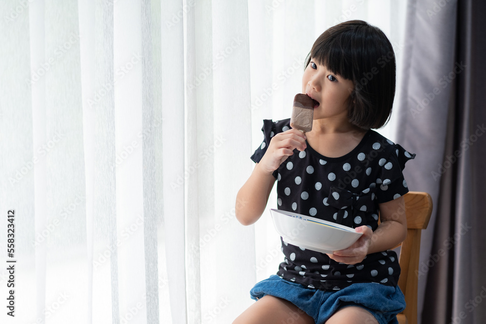 kid eating ice cream, delicious and happy concept kid eating ice cream, delicious and happy concept