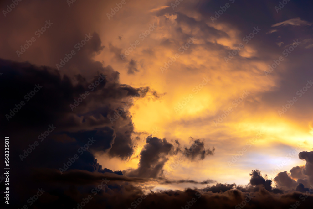 Majestic dramatic colorful sunset sky with fantastic cloud pictures in evening time over the tropical region in Ubud, Indonesia. Majestic dramatic colorful sunset sky with fantastic cloud pictures in evening time over the tropical region in Ubud, Indonesia.