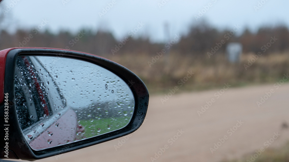 Car mirror on the background of the road Car mirror on the background of the road