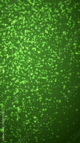 Snowy christmas background. Subtle flying snow flakes and stars on christmas green background. Delicate sweet snowy christmas. Vertical vector illustration.