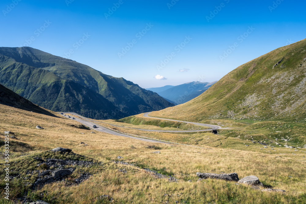 Amazing panoramic summer view of the famous Transfagarasan serpentine mountain road between Transylvania and Muntenia in Romania
