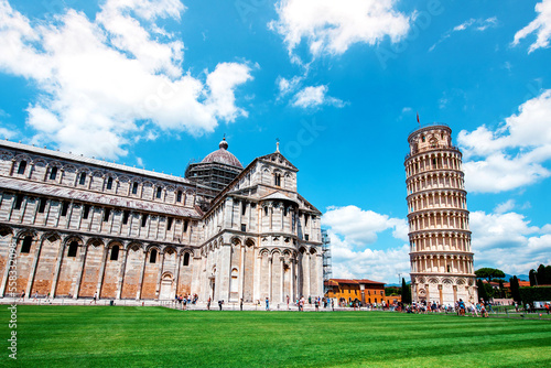 Obraz na płótnie Picturesque landscape with cathedral or Duomo di Santa Maria Assunta near famous Leaning Tower in Pisa, Italy. fascinating exotic amazing places. Piazza dei Miracoli. w salonie