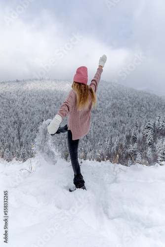 Young Woman playing with sn...