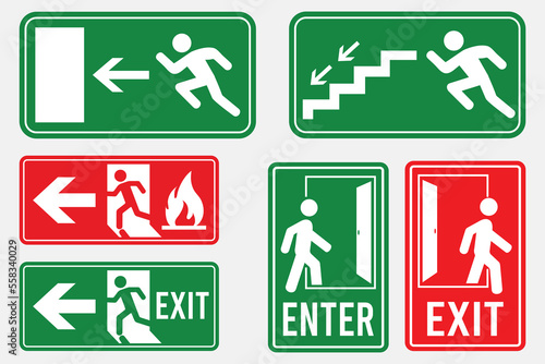 emergency exit signs on background photo