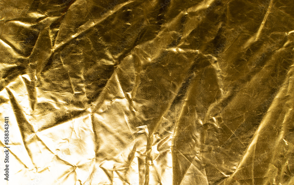 Fototapeta premium Crumpled Gold Fabric Texture Background, Wrinkled Bronze Pattern, Luxury Yellow Metallic Paper Mockup