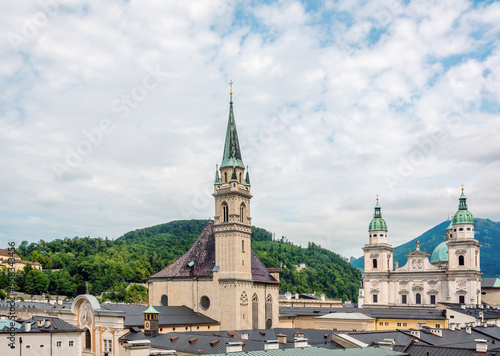 City view with Franciscan church and Salzburg Cathedral, Salzburg, Austria.