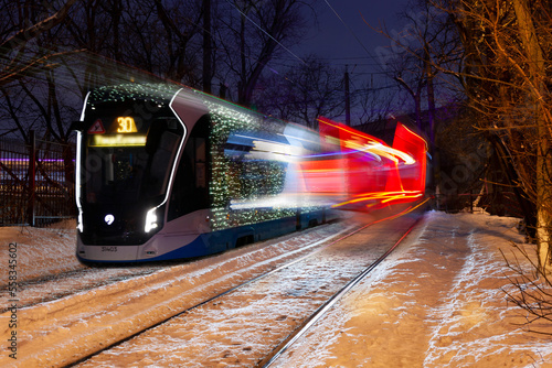 A Moscow tram on a snowy winter night at Voykovskiy district