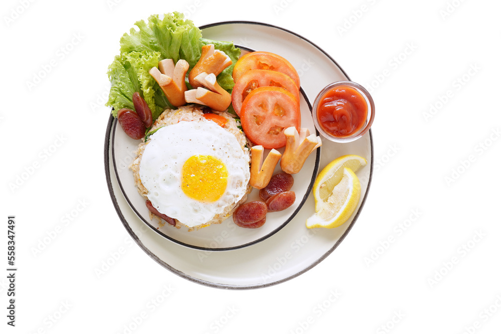Fried rice and hot dogs, cooked fried egg, Chinese sausage and ketchup on a white background. Fried rice and hot dogs, cooked fried egg, Chinese sausage and ketchup on a white background.