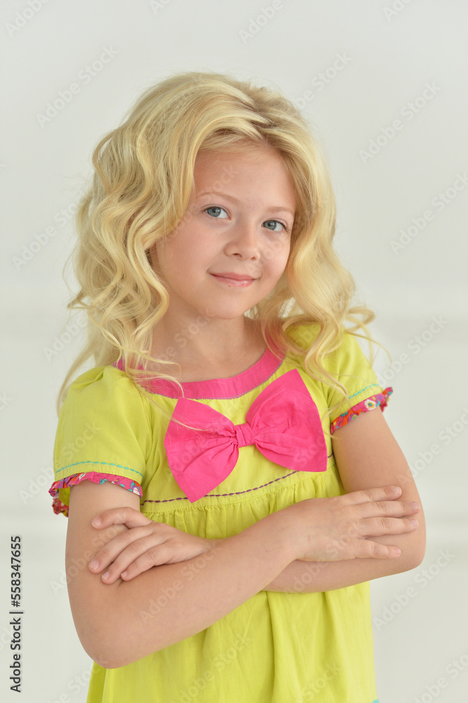 girl posing standing in a white studio girl posing standing in a white studio