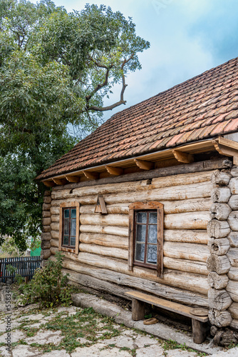 Russian hut, log house in the village