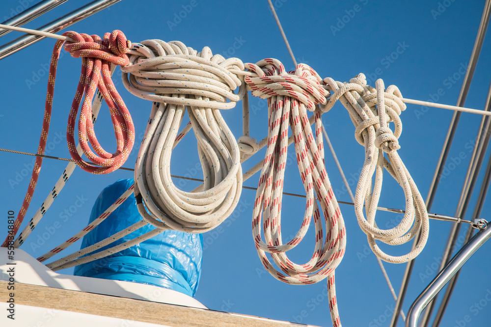 Coiled ship ropes on railing of motorboat closeup Stock Photo | Adobe Stock
