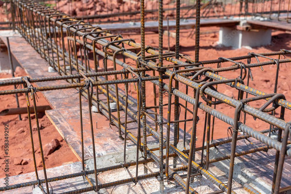 Tie the steel beam for build and reinforcement concrete beam at the buliding construction site