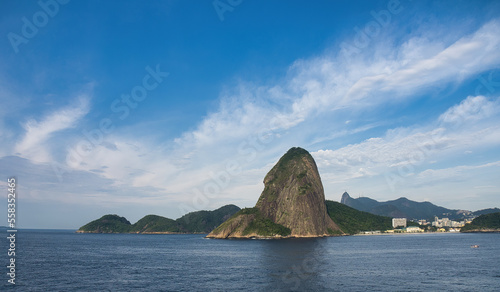 Sugarloaf Mountain from Behind during Red Sunset with View of Hills and Ocean, RIo de Janeiro, Brazil © manola72