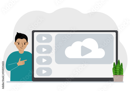 A little boy looks at the huge screen of a TV device, tablet or computer. The concept of a children's show or educational channel.