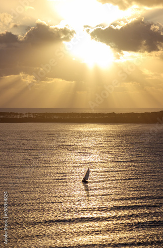 Sailboat under sunset