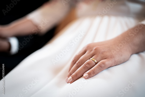 Detail of a wedding ring on hands during the big day, love is in the air