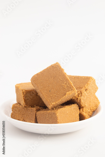 Winter Season Special Indian Til Barfi Or Burfi Also Known As Tilkut, Gajak, Gazak, Gachak Made Of Tilgul, Mungfali, Sesame Seed, Jaggery Gud, Badam And Pista For Makar Sankranti Or Lohri Celebration