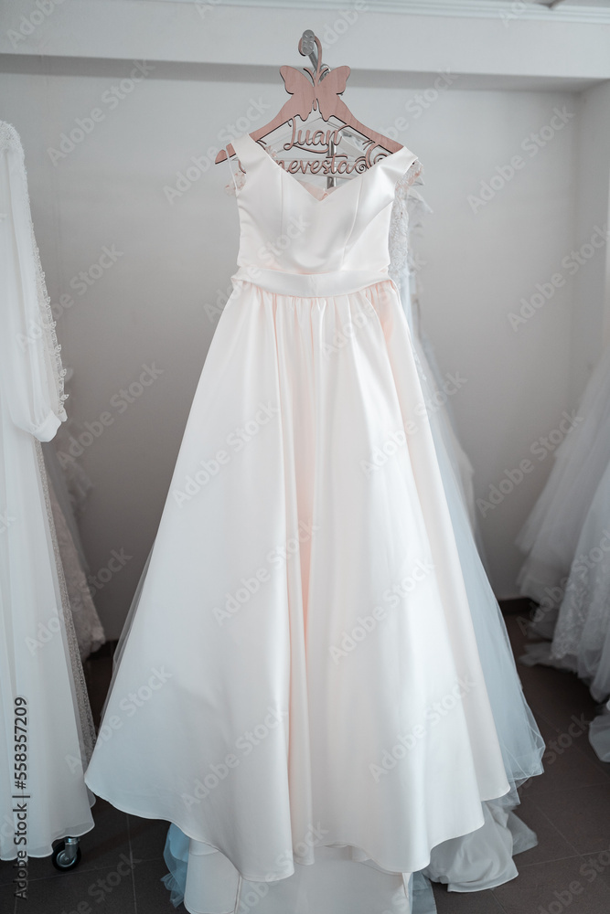 Wedding dresses in the shop waiting for brides Wedding dresses in the shop waiting for brides