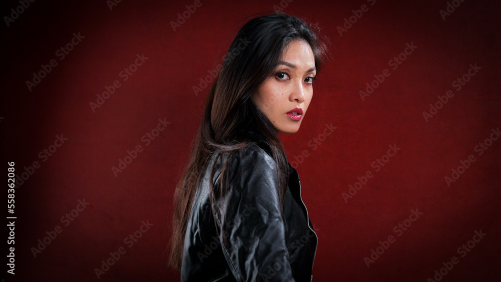 Portrait of a confident young woman - studio photography Portrait of a confident young woman - studio photography