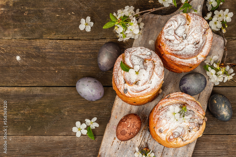 Easter cake Cruffin or sweet bread kulich with painted eggs. Traditional festive baking Easter cake Cruffin or sweet bread kulich with painted eggs. Traditional festive baking