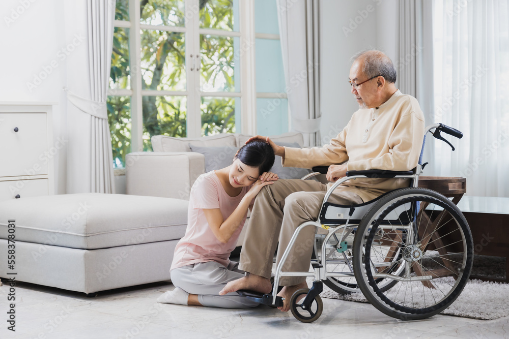 happy Asian family, senior man on wheelchair with daughter happy Asian family, senior man on wheelchair with daughter