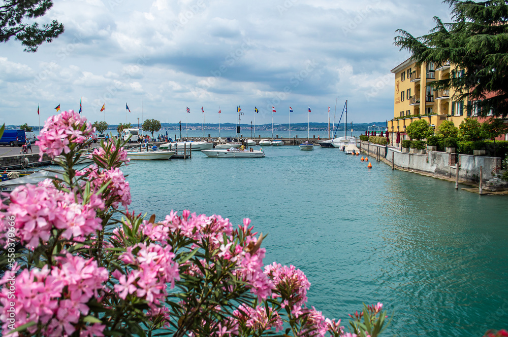 Beautiful view of Lake Garda, Italy. Lake and Mountains on a sunny summer day