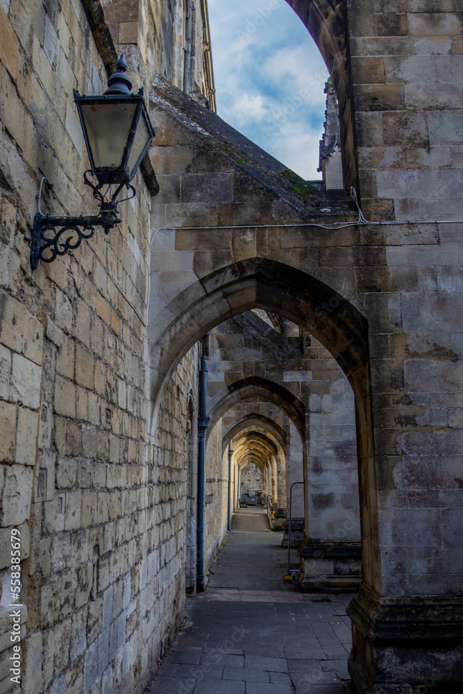 A row of arches along the side of Winchester Cathedral in Hampshire, UK