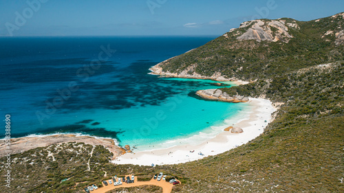 Aerial shot of turquoise colour water, little beach, and car park in Two Peoples Bay, Albany, Western Australia