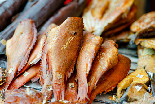 Selection of assorted home made smoked fish on a farmers market in Vilnius, Lithuania.