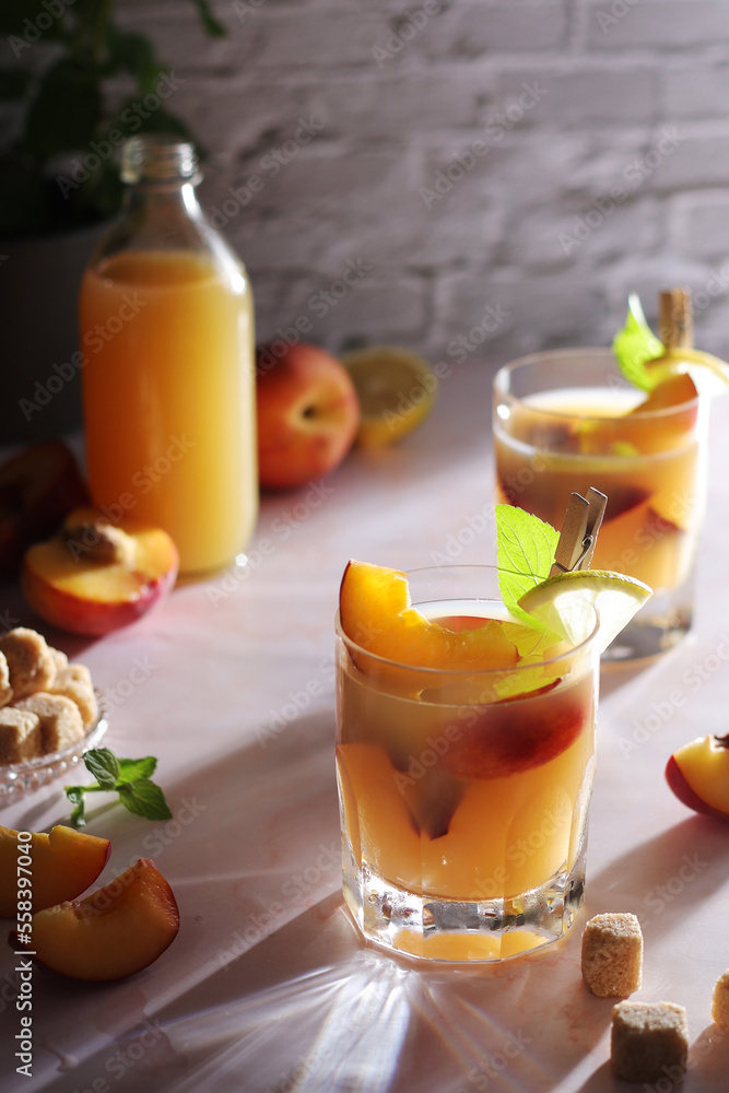 Glasses with peach juice cocktail Glasses with peach juice cocktail