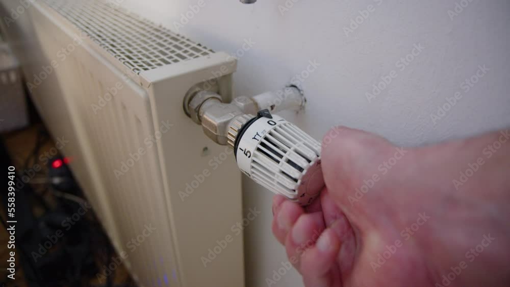 hand turning on and off radiator hand turning on and off radiator
