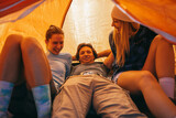 Friends having fun in  the tent