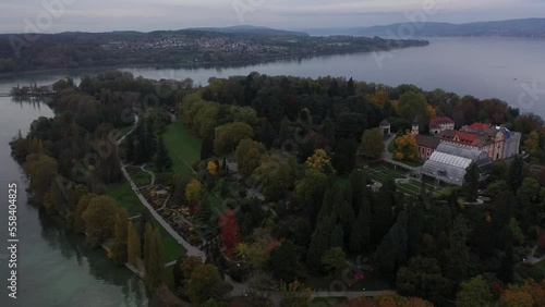 Flightover at a little siland on a lake.