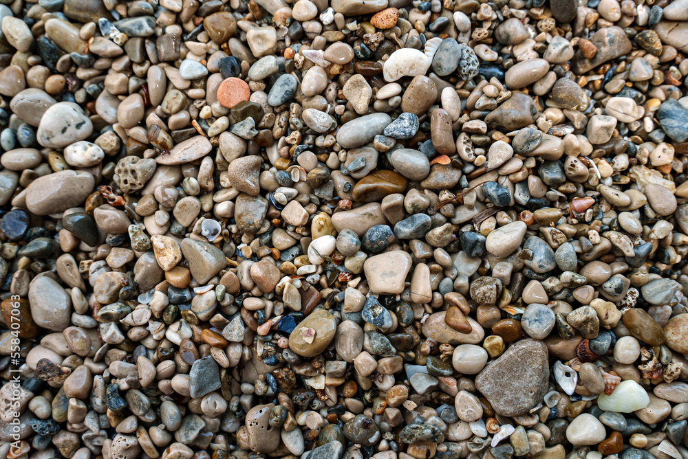 Sea stones background. Flat lay texture of sea stones. Sea stones background. Flat lay texture of sea stones.