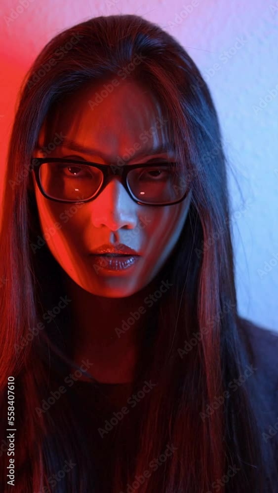 Young and pretty Asian - portrait shot in RGB colors - videoclip Young and pretty Asian - portrait shot in RGB colors - videoclip