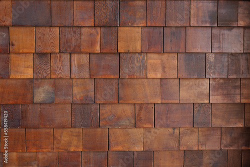 wooden roof shingle tile background and texture. timber decorates the wall. varnished wooden panel.