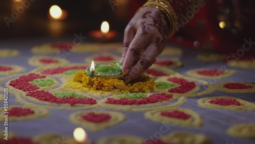 Happy Diwali - Diya lamps lit during diwali celebration photo