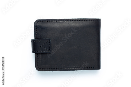 Black leather wallet on a button on a white background. Top view.