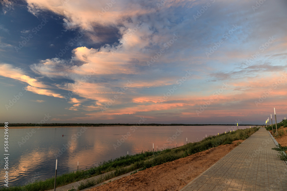 beautiful sunset on the embankment of light yar river volga russia