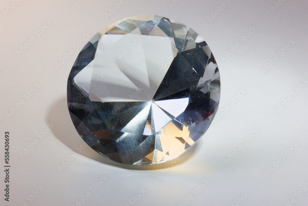 real glas objects with shadows formed as diamond on white table real glas objects with shadows formed as diamond on white table